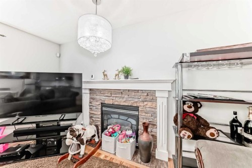 45 Shawbrooke Park Sw, Calgary, AB - Indoor With Fireplace