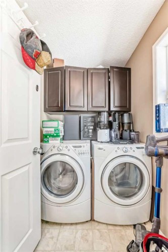 45 Shawbrooke Park Sw, Calgary, AB - Indoor Photo Showing Laundry Room