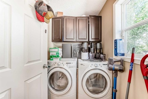 45 Shawbrooke Park Sw, Calgary, AB - Indoor Photo Showing Laundry Room