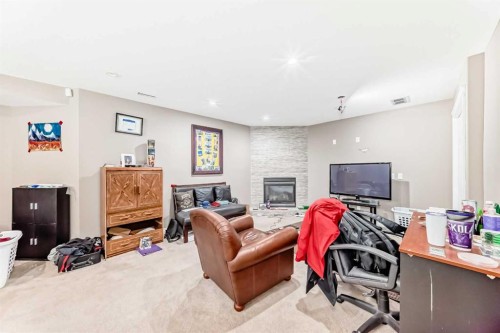 45 Shawbrooke Park Sw, Calgary, AB - Indoor With Fireplace