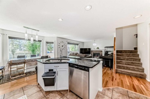 45 Shawbrooke Park Sw, Calgary, AB - Indoor Photo Showing Kitchen With Double Sink