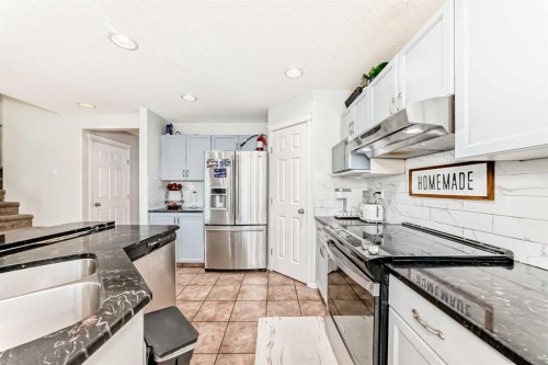 45 Shawbrooke Park Sw, Calgary, AB - Indoor Photo Showing Kitchen With Upgraded Kitchen
