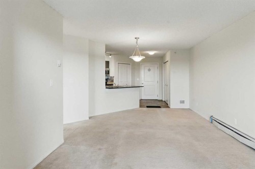 409-15 Saddlestone Way Ne, Calgary, AB - Indoor Photo Showing Other Room