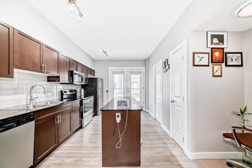 233 Kincora Glen Road Nw, Calgary, AB - Indoor Photo Showing Kitchen With Stainless Steel Kitchen With Double Sink