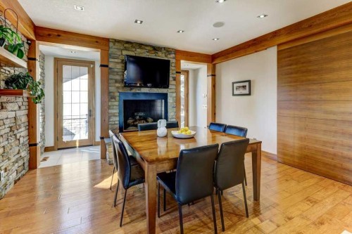 738 Crescent Road Nw, Calgary, AB - Indoor Photo Showing Dining Room With Fireplace