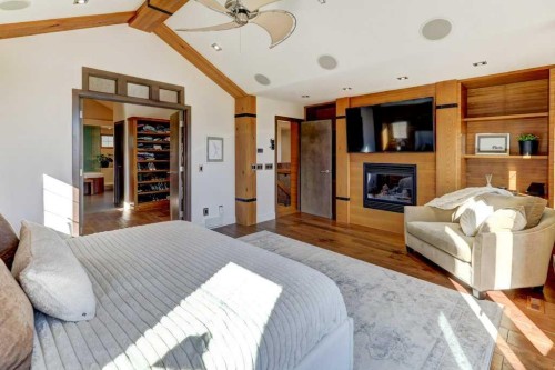 738 Crescent Road Nw, Calgary, AB - Indoor Photo Showing Bedroom With Fireplace