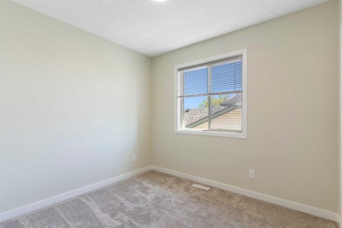 186 Harvest Rose Circle Ne, Calgary, AB - Indoor Photo Showing Other Room