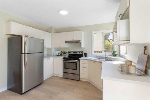 186 Harvest Rose Circle Ne, Calgary, AB - Indoor Photo Showing Kitchen With Stainless Steel Kitchen With Double Sink
