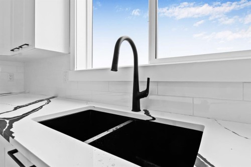 8 Ranchers Meadows, Okotoks, AB - Indoor Photo Showing Kitchen