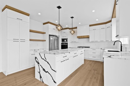 8 Ranchers Meadows, Okotoks, AB - Indoor Photo Showing Kitchen With Upgraded Kitchen