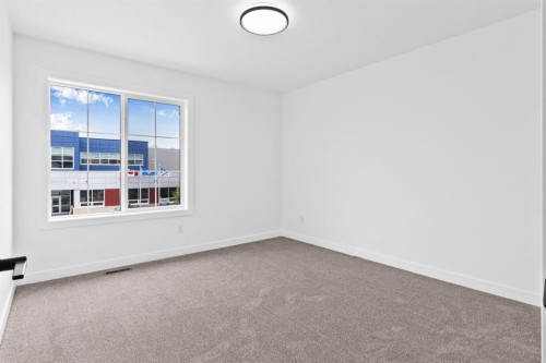 8 Ranchers Meadows, Okotoks, AB - Indoor Photo Showing Other Room