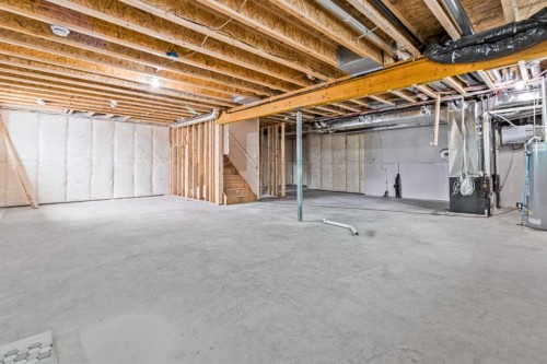 8 Ranchers Meadows, Okotoks, AB - Indoor Photo Showing Basement