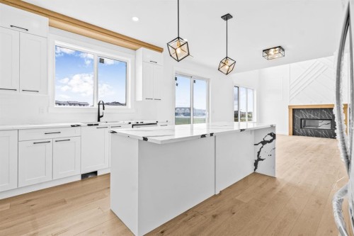 8 Ranchers Meadows, Okotoks, AB - Indoor Photo Showing Kitchen