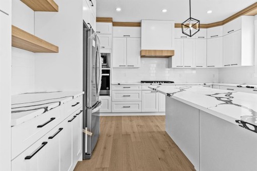 8 Ranchers Meadows, Okotoks, AB - Indoor Photo Showing Kitchen With Upgraded Kitchen