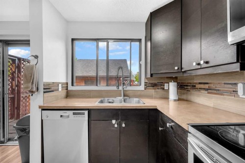 54 Templegreen Road Ne, Calgary, AB - Indoor Photo Showing Kitchen With Double Sink
