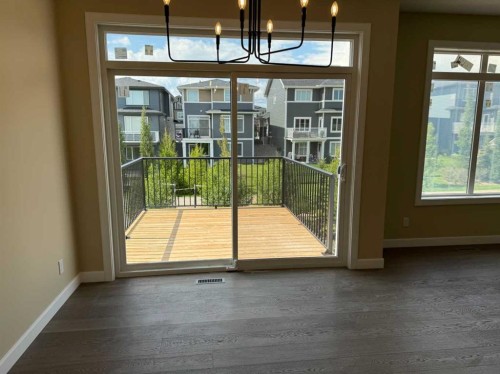 91 Sundown Crescent, Cochrane, AB - Indoor Photo Showing Other Room