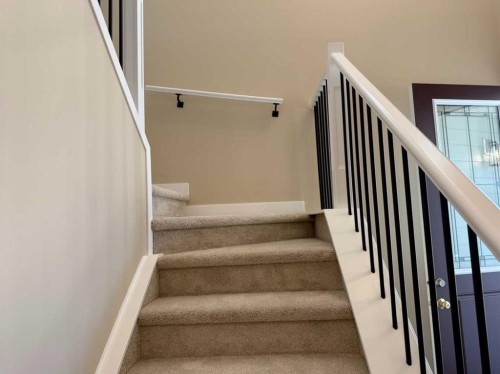 91 Sundown Crescent, Cochrane, AB - Indoor Photo Showing Other Room