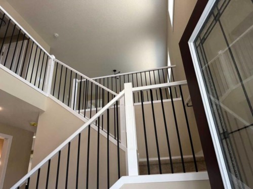 91 Sundown Crescent, Cochrane, AB - Indoor Photo Showing Other Room