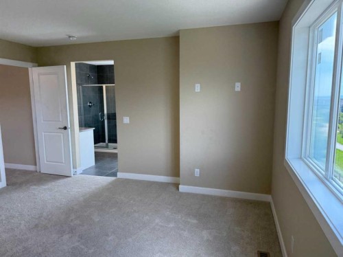 91 Sundown Crescent, Cochrane, AB - Indoor Photo Showing Other Room