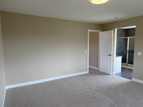 91 Sundown Crescent, Cochrane, AB - Indoor Photo Showing Other Room