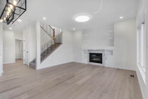 14 Ranchers Meadows, Okotoks, AB - Indoor With Fireplace