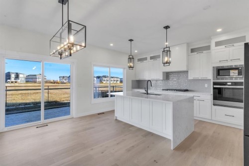 14 Ranchers Meadows, Okotoks, AB - Indoor Photo Showing Kitchen With Upgraded Kitchen