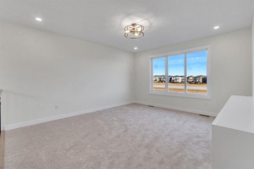 14 Ranchers Meadows, Okotoks, AB - Indoor Photo Showing Other Room