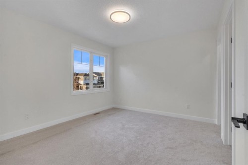 14 Ranchers Meadows, Okotoks, AB - Indoor Photo Showing Other Room