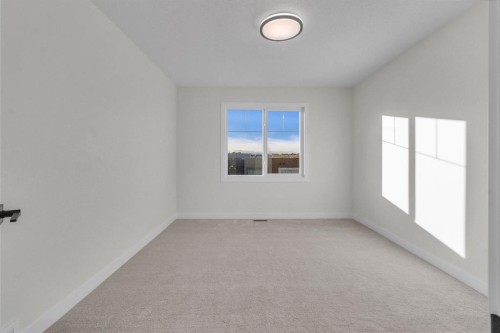 14 Ranchers Meadows, Okotoks, AB - Indoor Photo Showing Other Room