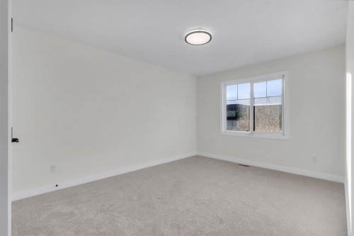 14 Ranchers Meadows, Okotoks, AB - Indoor Photo Showing Other Room