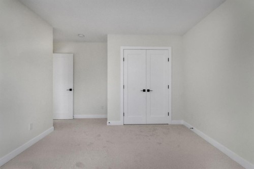 14 Ranchers Meadows, Okotoks, AB - Indoor Photo Showing Other Room