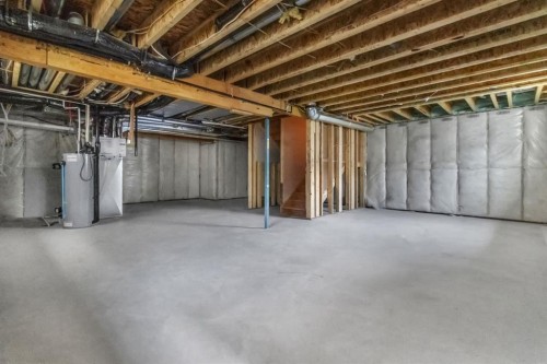14 Ranchers Meadows, Okotoks, AB - Indoor Photo Showing Basement