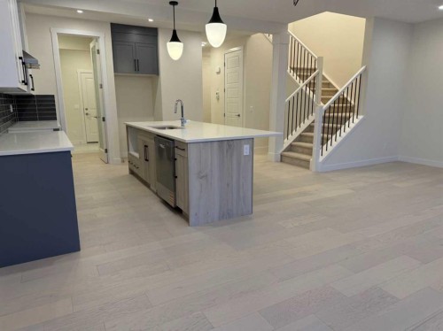 92 Sundown Crescent, Cochrane, AB - Indoor Photo Showing Kitchen