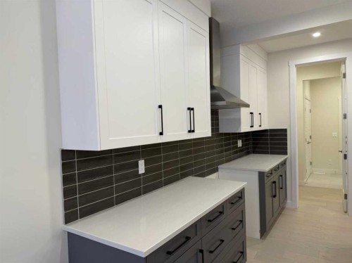 92 Sundown Crescent, Cochrane, AB - Indoor Photo Showing Kitchen