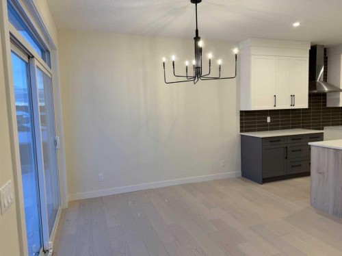 92 Sundown Crescent, Cochrane, AB - Indoor Photo Showing Kitchen