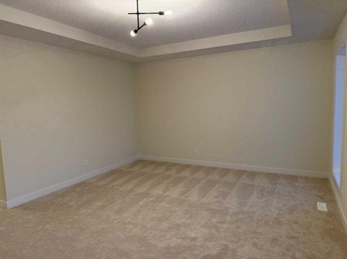 92 Sundown Crescent, Cochrane, AB - Indoor Photo Showing Other Room