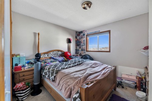 717 Coral Springs Boulevard Ne, Calgary, AB - Indoor Photo Showing Bedroom