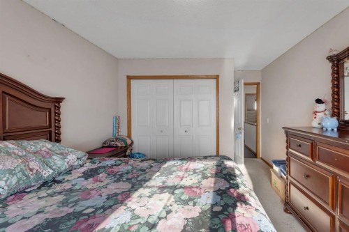 717 Coral Springs Boulevard Ne, Calgary, AB - Indoor Photo Showing Bedroom