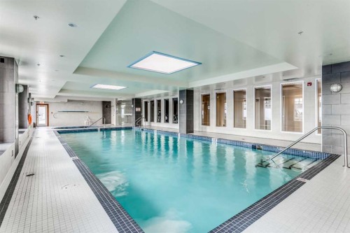 2347-2330 Fish Creek Boulevard Sw, Calgary, AB - Indoor Photo Showing Other Room With In Ground Pool