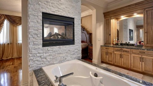 1911 13 Avenue Nw, Calgary, AB - Indoor Photo Showing Bathroom With Fireplace