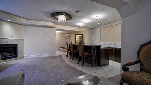 1911 13 Avenue Nw, Calgary, AB - Indoor Photo Showing Living Room With Fireplace