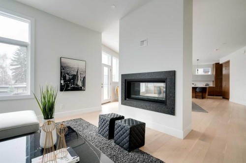 711 Imperial Way Sw, Calgary, AB - Indoor Photo Showing Living Room With Fireplace
