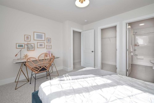 219 Calais Drive Sw, Calgary, AB - Indoor Photo Showing Bedroom