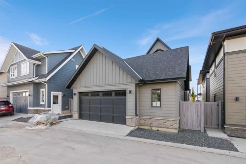 219 Calais Drive Sw, Calgary, AB - Outdoor With Facade