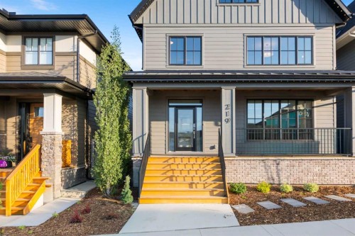 219 Calais Drive Sw, Calgary, AB - Outdoor With Facade