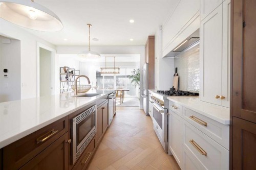 219 Calais Drive Sw, Calgary, AB - Indoor Photo Showing Kitchen With Upgraded Kitchen