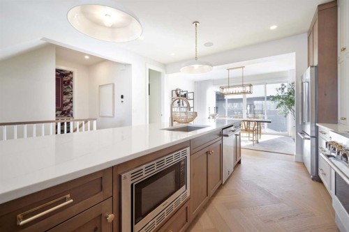 219 Calais Drive Sw, Calgary, AB - Indoor Photo Showing Kitchen With Upgraded Kitchen