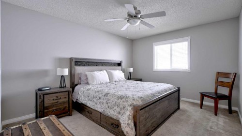78 Athabasca Crescent, Crossfield, AB - Indoor Photo Showing Bedroom