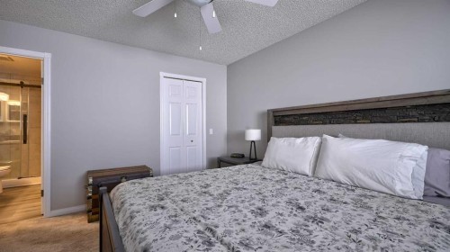 78 Athabasca Crescent, Crossfield, AB - Indoor Photo Showing Bedroom