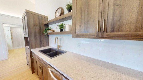 731 7 Avenue West, Cardston, AB - Indoor Photo Showing Kitchen With Double Sink